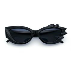 These oversized gothic fashion sunglasses exude luxury and are ideal for making a striking statement. Featuring an asymmetrical bold chunky crystal jewel trim, the sunglasses boast a stylish gothic cat eye silhouette, sure to captivate attention. Available in various color options, you can effortlessly match them with your unique style. Equipped with wide-range gradient UV400 polycarbonate lenses, your eyes will be well-protected from the sun's harmful rays. Indulge in luxury and elevate your wa Gothic Cat, Candy Crystals, Eye Silhouette, Plastic Sunglasses, Rock Candy, Gothic Fashion, Fashion Sunglasses, Cloth Bags, Cat Eye Sunglasses