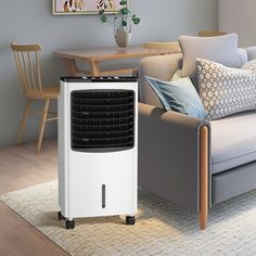 an air cooler sitting on top of a living room floor