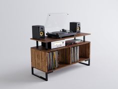 a record player sitting on top of a wooden shelf