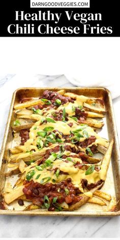 baked cheesy fries in a baking pan with text overlay