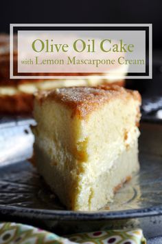 a slice of olive oil cake with lemon mascarpone cream on a glass plate