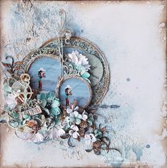 an altered photograph with flowers and birds on the frame, in pastel blue tones