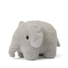 an elephant stuffed animal on a white background