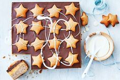 chocolate and star shaped cookies with icing on top