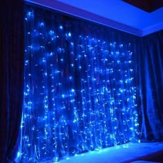 the curtains are covered with blue lights