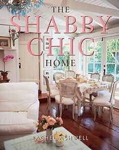 the shabby chic home book cover with white furniture and pink flowers in vase