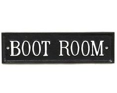 a black and white sign that says boot room