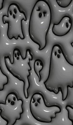 a group of ghost like objects in grey and black colors, with white outlines on them