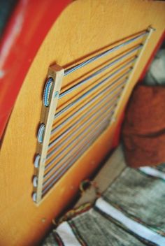 a close up of an old fashioned wooden instrument