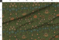 an image of a green and orange floral pattern on a plain background with measurements for the fabric