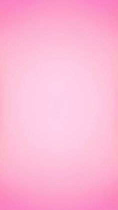 an abstract pink background with small white dots