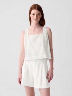 Soft linen-blend cropped shell tank top.  Square neck.  Tank straps.  Buttons at back.  * Fit: Slightly fitted.  Sits close to the body.  Cropped, hits at the waist.  Models wearing Gap Fitted Cropped Top By Gap, Fitted Linen Tank Top For Everyday, Chic Sleeveless Gap Tops, Chic Sleeveless Tops By Gap, Fitted Linen Tank Top For Spring, Casual Slightly Cropped Summer Tank Top, Casual Slightly Cropped Tank Top For Summer, Chic Cropped Tank Top For Everyday, Gap Cropped Tops For Spring