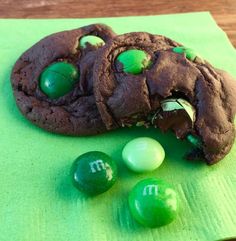 chocolate cookie with m and m candies on green napkin