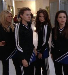 the mean girls are dressed in cheerleader outfits