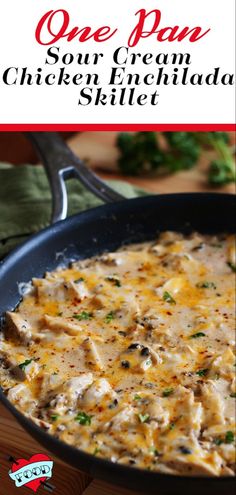 a skillet filled with chicken and cheese