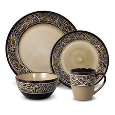 a brown and black dinner set with two cups