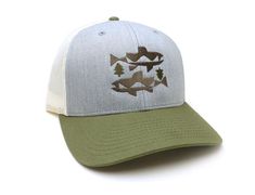 A classic mesh-back trucker hat that shows a modern/geometric design of two trout and two trees locked cohesively together. The perfect hat for anyone who enjoys alpine time. This high quality mesh trucker makes a great fisherman gift for dad or a wonderful birthday or Christmas gift for your favorite person!A Cotton Twill based Custom Trucker HatHeather Grey Front - Muted Tan Mesh Back - Forest Green BillPre Curved Visor and Classic SnapbackMesh Backed, 6 Panel Embroidered Isacord2 Thread Color Casual Flat Brim Trucker Hat For Fishing, Trucker Hat For Fishing With Flat Bill, Trucker Hat Men, Trucker Snapback Hat With Flat Bill For Fishing, Summer Fishing Trucker Hat, Bday Gift For Boyfriend, Trucker Snapback Hat For Fishing, Fish Hat, Fishing Cap