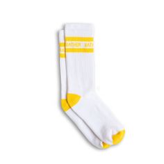 White Bather crew socks with two yellow stripes and text logo around ankle Comfortable Sports Socks For Spring, Comfortable Cotton Knee-high Socks For Spring, Sporty Anti-odor Cotton Socks, Casual Summer Streetwear Socks, Comfortable Cotton Socks For Streetwear, Comfortable Cotton Anti-odor Socks, Comfortable Stretch Yellow Socks, Casual Sports Socks For Spring, Sporty Stretch Socks For Summer