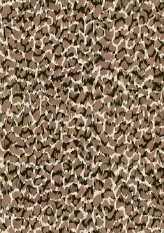 a brown and white animal print pattern with black spots on the bottom half of it