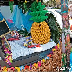 a pineapple sitting on top of a table next to other decorations