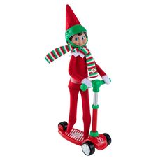 an elf is riding on a scooter