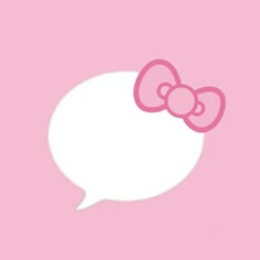 a pink hello kitty wallpaper with a white speech bubble in the shape of a bow