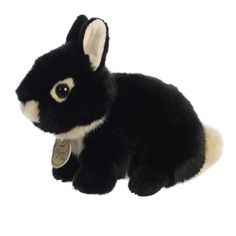 a black and white stuffed animal rabbit