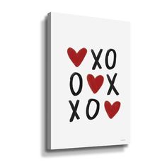 a white canvas with red hearts and the word xoxo on it in black ink