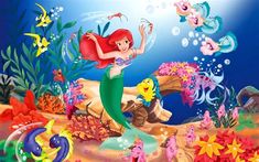 the little mermaid and her friends are swimming in the ocean