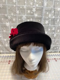 I made this beautiful velvet hat out of a rich black velvet and lined it with a matching color fleece for warmth and body.  It's sized to fit most adults 22-23 inches around head.  The brim can be worn up or down as it has velvet on both sides.  It's a very comfortable fit on my 22 1/2 inch head.  Dry clean only. I added a handmade burgundy velvet rose for a pretty look.  A great hat for any season. And yes, there are that many pieces for this hat that have to be cut, ironed and sewn together! Velvet Rose, Velvet Hat, Burgundy Velvet, Black Velvet, How To Look Pretty, Color Matching, Caps Hats, Accessories Hats, Comfort Fit