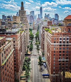 an aerial view of a city with tall buildings