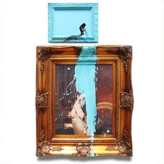 an image of a man on a surfboard in a frame with water dripping from it