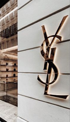 a building with a sign that says ysl on it