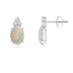 These enchanting solitaire stud earrings in 14K white gold showcase a captivating opal that allures with its unique color play. A trio diamond cluster crowns the top of the opal for a sparkling finish. Color Play, Opal Earrings Stud, Solitaire Studs, Opal Studs, Opal Earrings, Fine Jewellery Earrings, Natural Opal, Diamond Cluster, Gemstone Jewelry