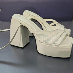 White Platform Strappy Sandals From Dolls Kill Brand New, Never Worn. No Imperfections. Super Cute White Block Heel Platform Strappy Sandals, Open Toe, Strappy At The Toe, Square Toe Platform Sandra's Are So Trendy & Popular Now! They Remind Me Of Naked Wolfe Shoes. Size 8. Brand Is Dolls Kill. Beach Sandals, Malibu Shoes. The Ultimate Beach Shoe & Summer Shoe. All Sales Are Final. Ready To Ship. No Box Included. Trendy White Heels With Eva Material, White Strappy Heels For Vacation, White Open Toe Heels With Eva, Trendy White Strappy Heels, Trendy White Beach Heels, Casual White Strappy Heels, White Strappy Heels For Beach, White Strappy Beach Heels, Cute White Platform Heels