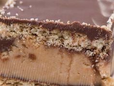 a close up of a piece of cake with chocolate frosting