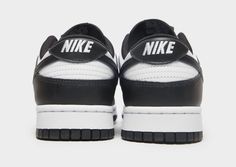 The '85 icon is back with these men's Dunk Low Retro sneakers from Nike. Keeping the OG design lines inspired by college basketball, these low-profile kicks have a premium leather upper in a classic Black and White colourway. They feature a secure lace up fastening, a padded ankle collar and are sat on a soft foam midsole for supreme cushioning. Created for the hardwood but evolved for the streets, these trainers are finished with signature Nike branding and the iconic Swoosh logo to the sidewalls. Please Note: This item is limited to one per person. Nike Branding, Swoosh Logo, Retro Sneakers, White Nike, College Basketball, Nike Dunk Low, Jd Sports, Dunk Low, Nike Dunk