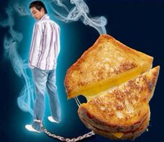 a man standing next to a grilled cheese sandwich on a chain with the image of a person behind it