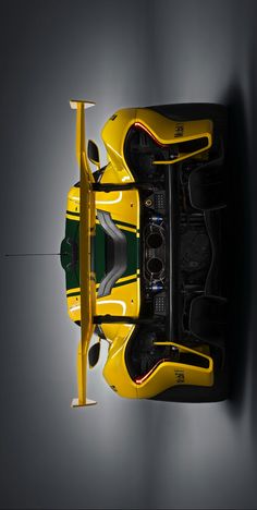 an overhead view of a yellow race car