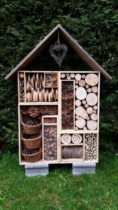 a house made out of logs and other items