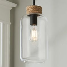 a light bulb hanging from a ceiling fixture