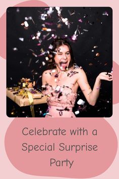 a woman in a pink dress holding a gift box and confetti on her face