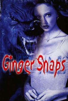 a woman standing next to a large monster with the words ginger snaps written on it