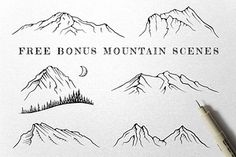 some mountains and trees are drawn on a piece of paper