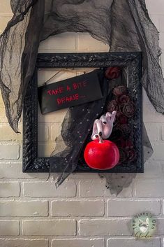 there is a fake apple in the frame