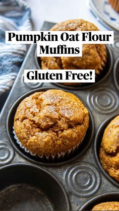 several muffins in a cupcake pan on a table