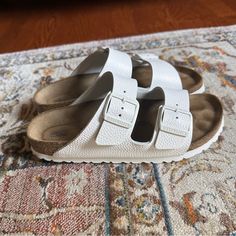 White Birkenstock Sz 39 / 9 Worn Once For Errands Comfortable White Sandals With Cork-bed Midsoles, Classic White Flat Sandals, Classic White Sandals With Leather Footbed, Classic White Sandals With Cork-bed Midsoles, Classic White Sandals With Flat Heel, White Flat Sandals With Textured Sole, Classic White Slip-on Sandals, White Sandals With Cushioned Footbed And Round Toe, White Round Toe Sandals With Cushioned Footbed