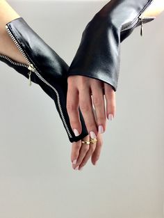 Long genuine leather fingerless gloves without a thumb hole, with plastic zipper. Made from high quality italian leather. These gloves are made of 100% genuine and chemical-free leather hand-sewn, unlined. They look great on your hand and look great in any outfit! The leather is soft and tender, which means that you will have the perfect fit, but you will feel absolutely comfortable even in the summer. Available sizes: 7,6 - 8,6 in / 20-22 cm length Palm width (circumference) : XS  =  16 - 17 cm Fingerless Leather Gloves With Storage, Leather Gloves Artwork, Leather Fingerless Gloves, Long Leather Gloves, Brown Leather Gloves, Evening Gloves, Fashion Gloves, Formal Gloves, Black Goth