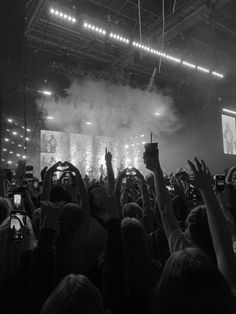 black and white photo of the crowd throwing their hands up in enjoyment looking at the festival stage of their favourite musical artist Blurry Concert Aesthetic, Dark Concert Aesthetic, Party Asthetics Photos, Sarah Sprinz, The Darkness Band, Protagonist Aesthetic, Peter Han, Black Electric Guitar, Live Music Photography