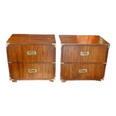 two wooden drawers with brass handles on each side